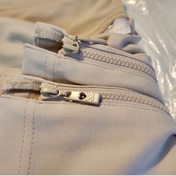 Belle by Kim Gravel Tan ankle pants with Zippers. Size 12. - Picture 7 of 9
